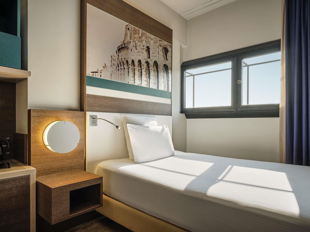Habitación Classic Individual del hotel Mercure Roma Centro Colosseo. Foto 1