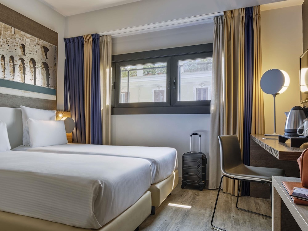 Habitación superior con 2 camas individuales del hotel Mercure Roma Centro Colosseo