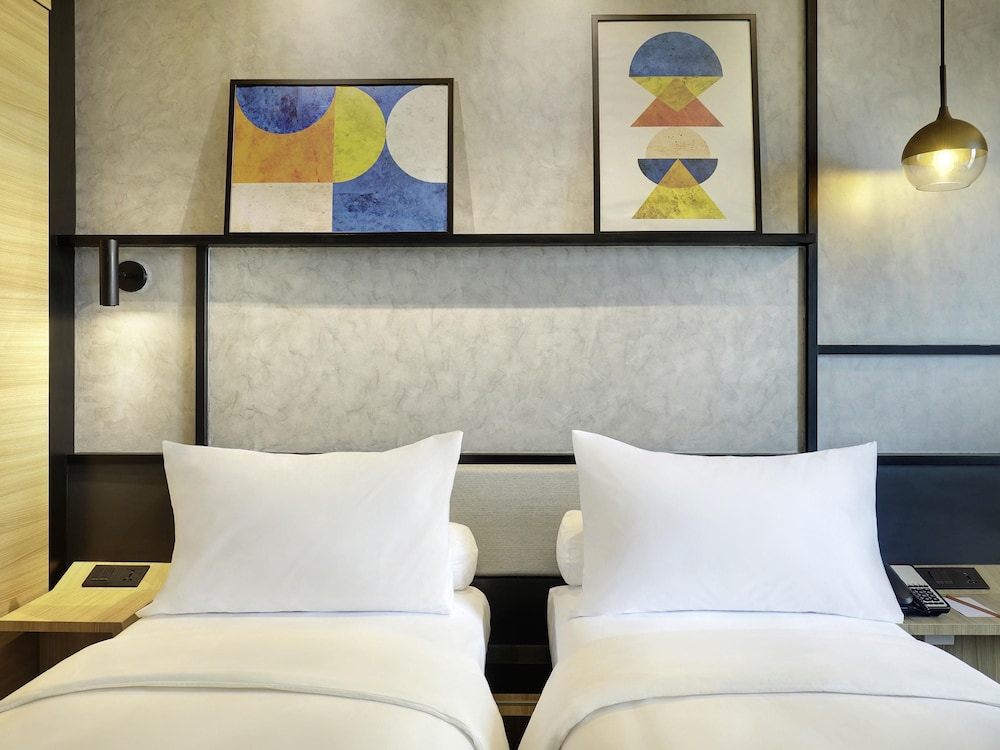 Habitación Estándar - 2 camas individuales del hotel Ibis Samarinda. Foto 2
