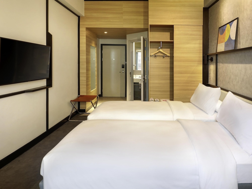 Habitación Estándar - 2 camas individuales del hotel Ibis Samarinda. Foto 3