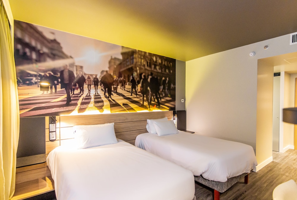 Habitación superior con 2 camas individuales del hotel Novotel Curitiba Batel. Foto 1