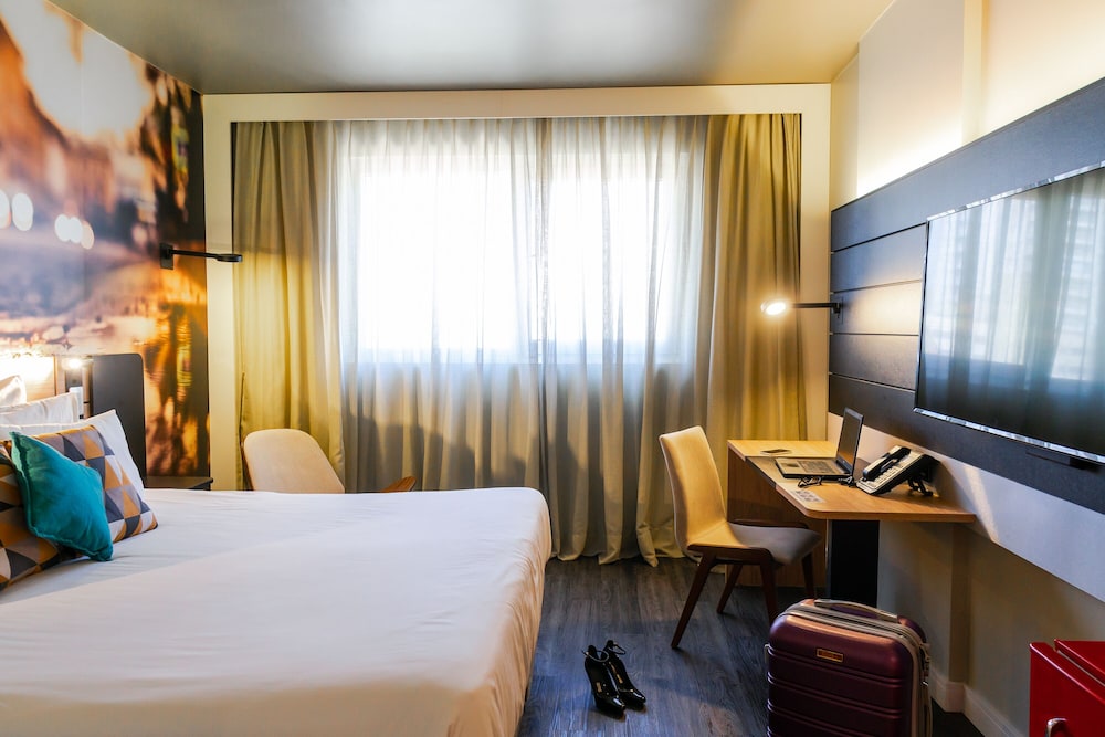 Habitación Executive con 1 cama king size del hotel Novotel Curitiba Batel. Foto 3
