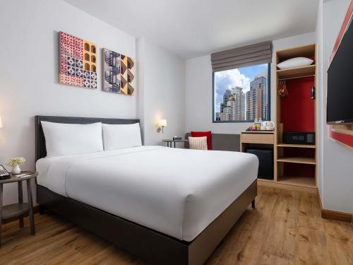 Habitación Estándar - 1 cama grande del hotel Ibis Bangkok Sukhumvit 24. Foto 1
