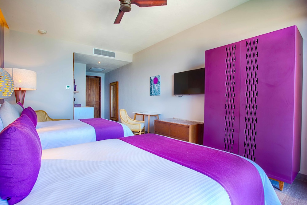 Habitación Lush, 2 Camas Dobles, Vista al Jardín del hotel Armony Marival Resort & Spa Punta de Mita - MGallery collection. Foto 1