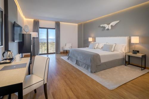 Habitación Familiar Deluxe del hotel Barcelo Aracena. Foto 1