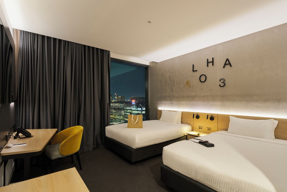 Habitación Estándar con 2 camas dobles del hotel Novotel Melbourne South Wharf. Foto 1