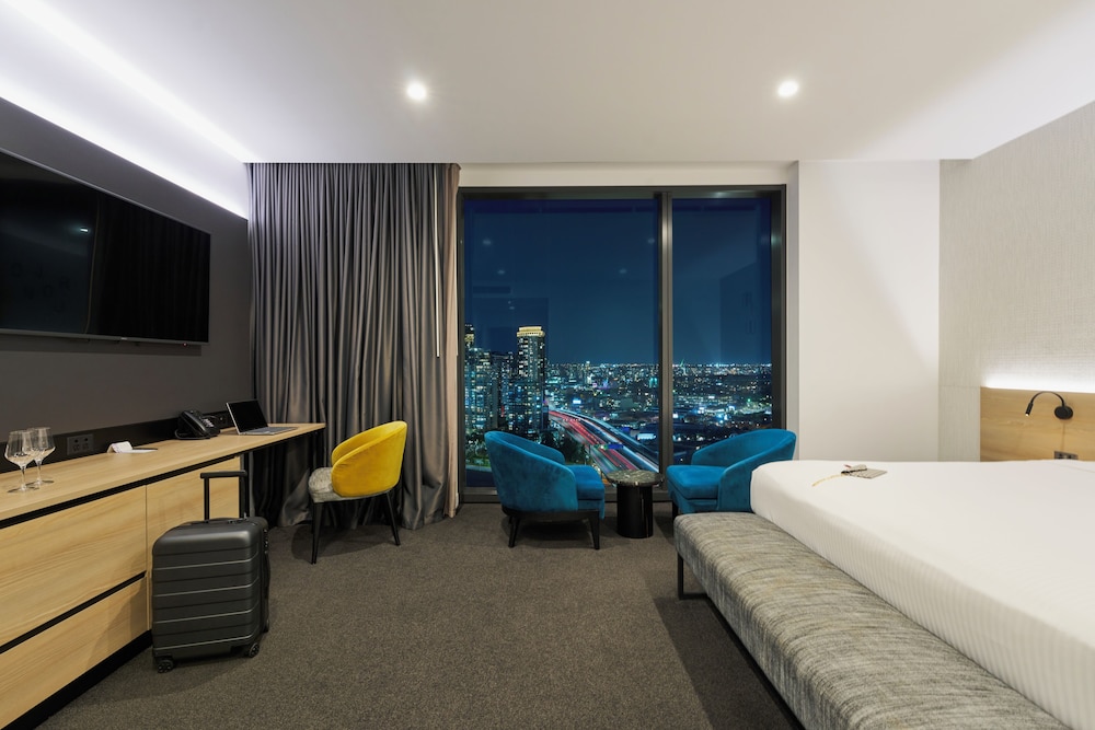 Suite Junior con Vistas a la Ciudad y 1 Cama King del hotel Novotel Melbourne South Wharf. Foto 1