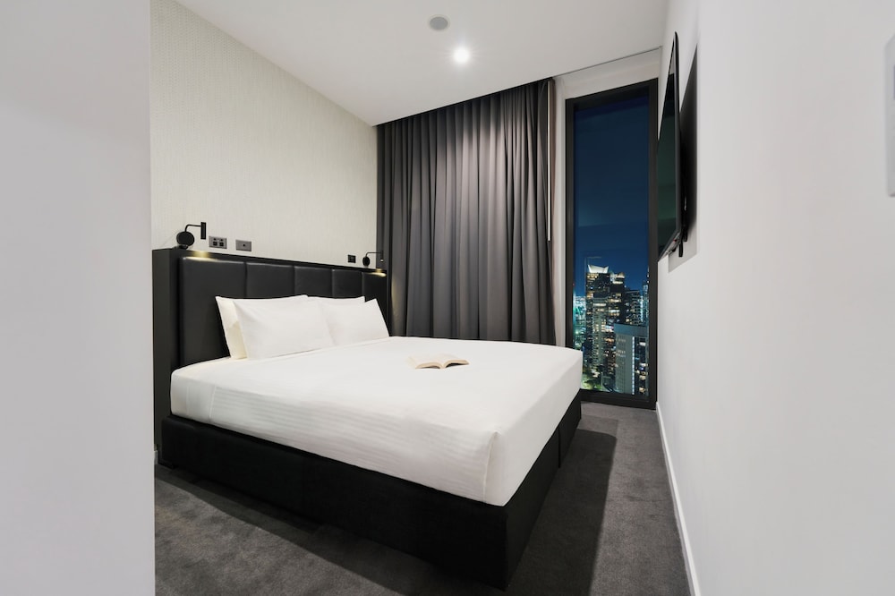 Apartamento Deluxe con Vistas a la Ciudad y 2 Dormitorios con 1 Cama King y 2 Camas Individuales del hotel Novotel Melbourne South Wharf. Foto 2