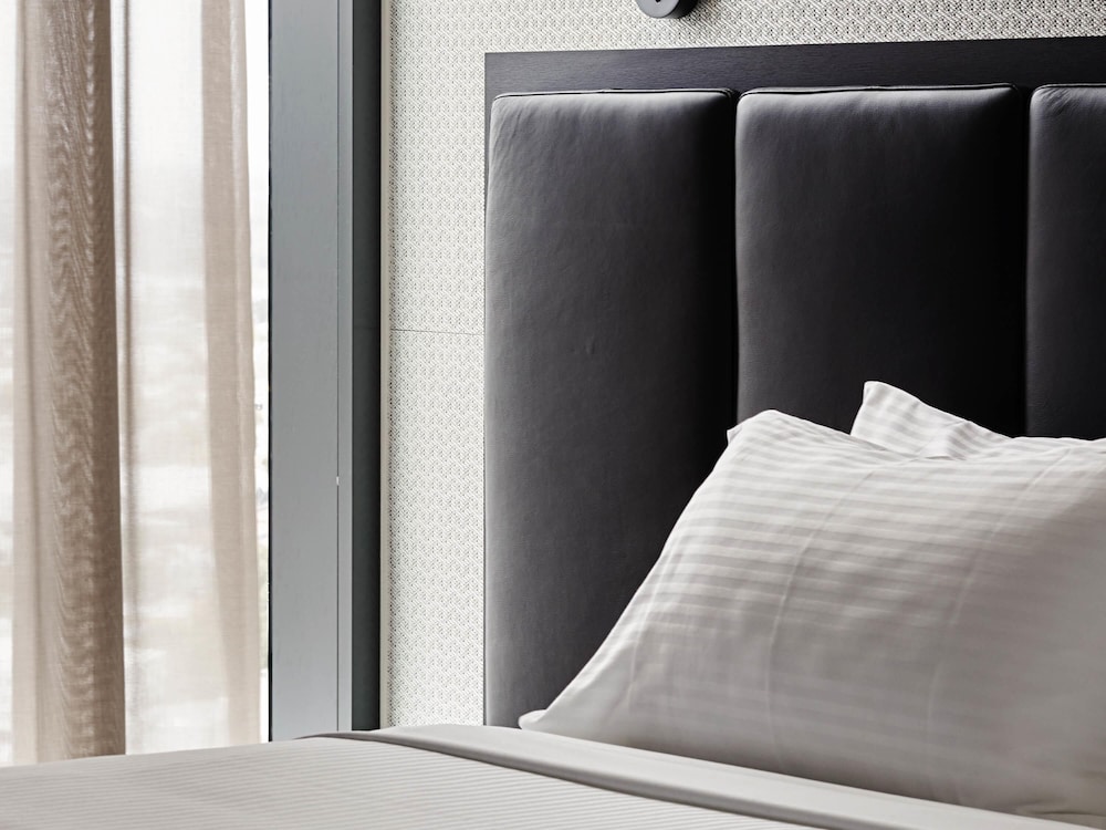Apartamento Deluxe con Vistas a la Ciudad y 2 Dormitorios con 1 Cama King y 2 Camas Individuales del hotel Novotel Melbourne South Wharf. Foto 7