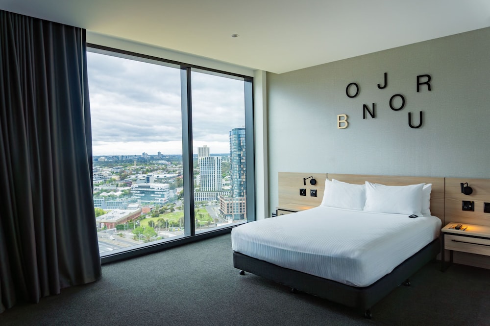 Habitación Estándar con 1 Cama Queen Accesible del hotel Novotel Melbourne South Wharf. Foto 9