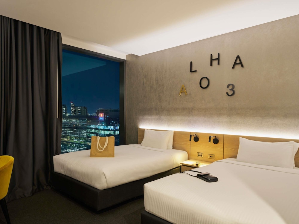 Habitación Estándar con 2 camas dobles del hotel Novotel Melbourne South Wharf. Foto 6