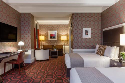 Junior suite Lujo Superior Sofá Cama incluido 2 Camas dobles del hotel Empire