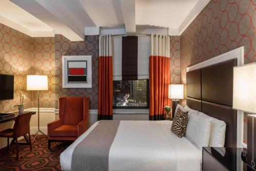 Habitación con cama extragrande - Adaptada para personas de movilidad reducida del hotel Empire. Foto 1