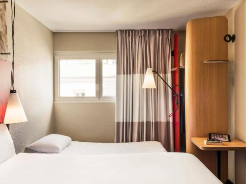 Habitación Doble Estándar con sofá del hotel Ibis Paris Place D'Italie 13ème