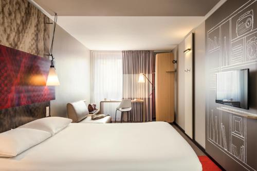 Habitación Doble Estándar con sofá del hotel Ibis Paris Place D'Italie 13ème. Foto 7