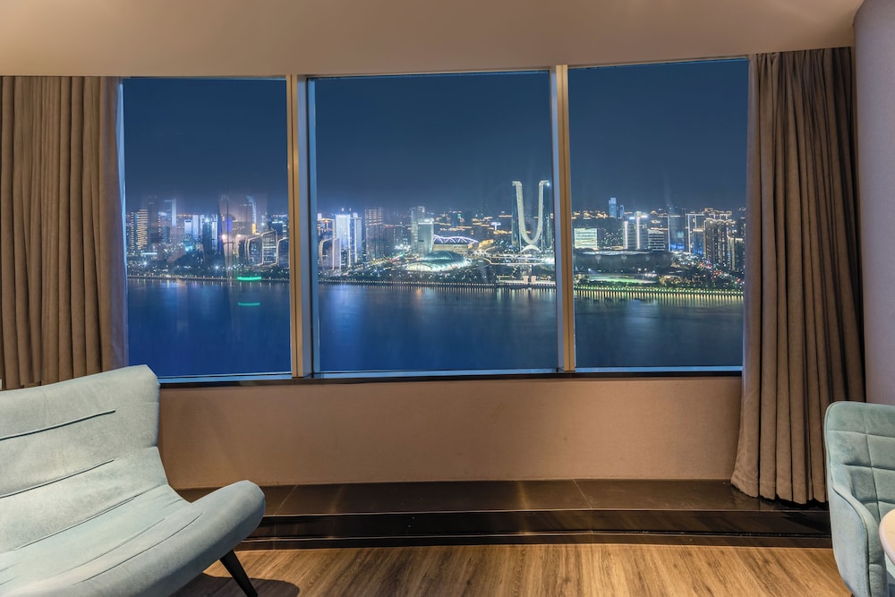 Habitación Deluxe con 1 cama king size, Vista al río del hotel Mercure Hangzhou Qianjiang. Foto 3
