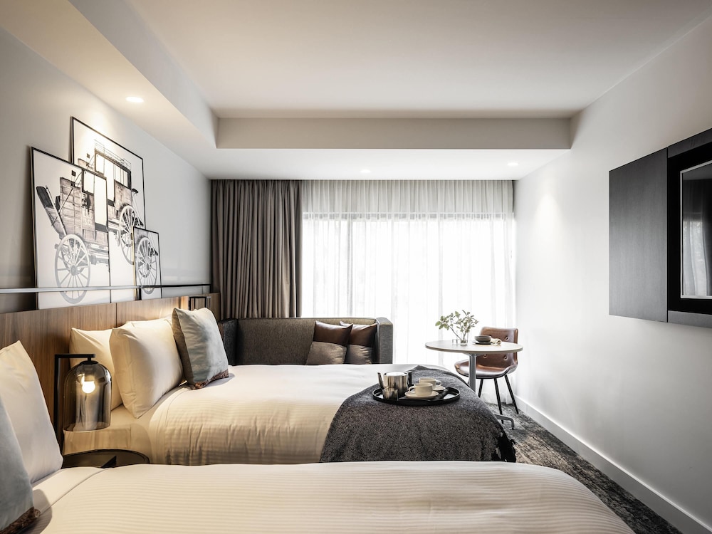 Habitación superior, 2 camas dobles del hotel Mercure Sydney Rouse Hill. Foto 1