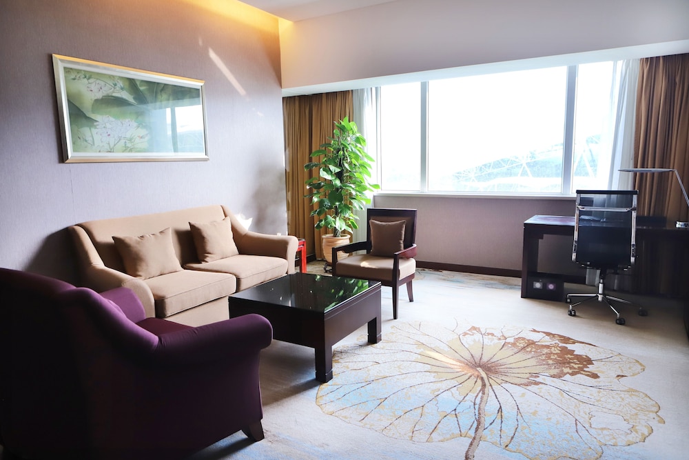 SUITE DELUXE, 1 Cama King Size, Vistas al Aeropuerto del hotel Pullman Guangzhou Baiyun Airport. Foto 4