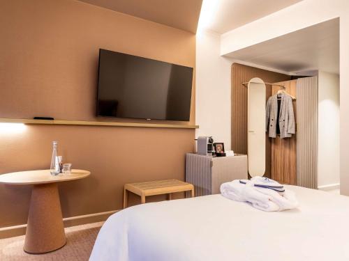 Habitación Doble Executive con sofá cama del hotel Novotel Paris Orly Rungis. Foto 2