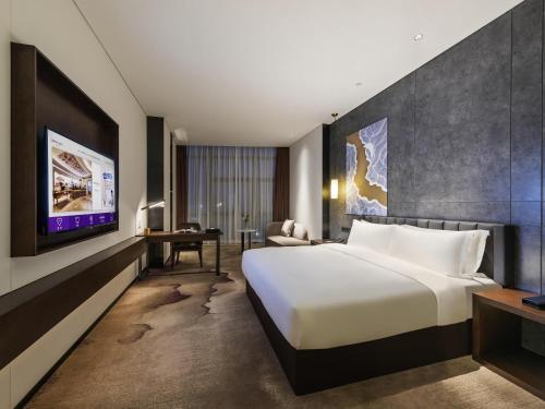 Habitación Estándar - Cama extragrande del hotel Mercure Shenzhen Pinghu