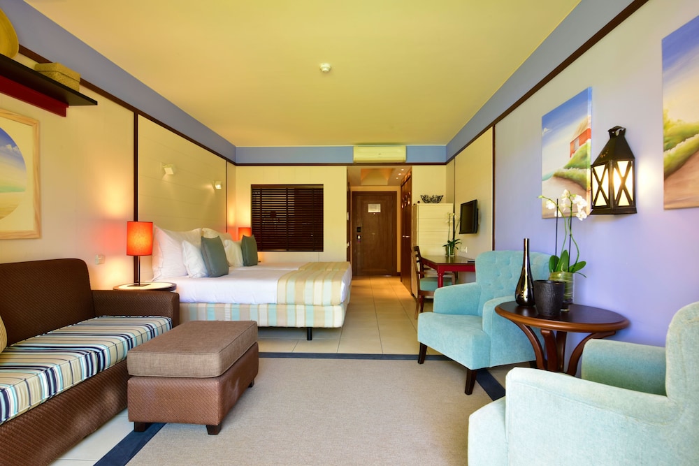 Habitación con 1 cama doble o 2 individuales, vistas a la piscina del hotel Pestana Porto Santo Beach Resort and SPA - All Inclusive