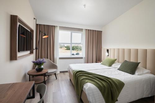 Habitación Doble Deluxe del hotel Klaustur. Foto 3