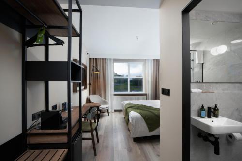 Habitación Doble Deluxe del hotel Klaustur. Foto 12