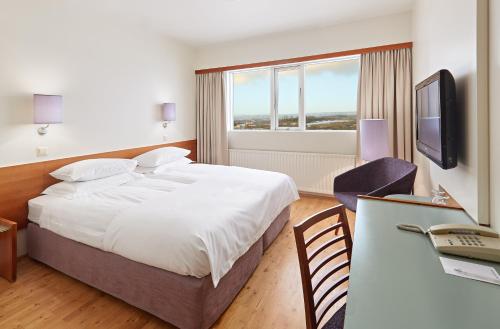 Habitación con cama extragrande. del hotel Hérað - Berjaya Iceland Hotels