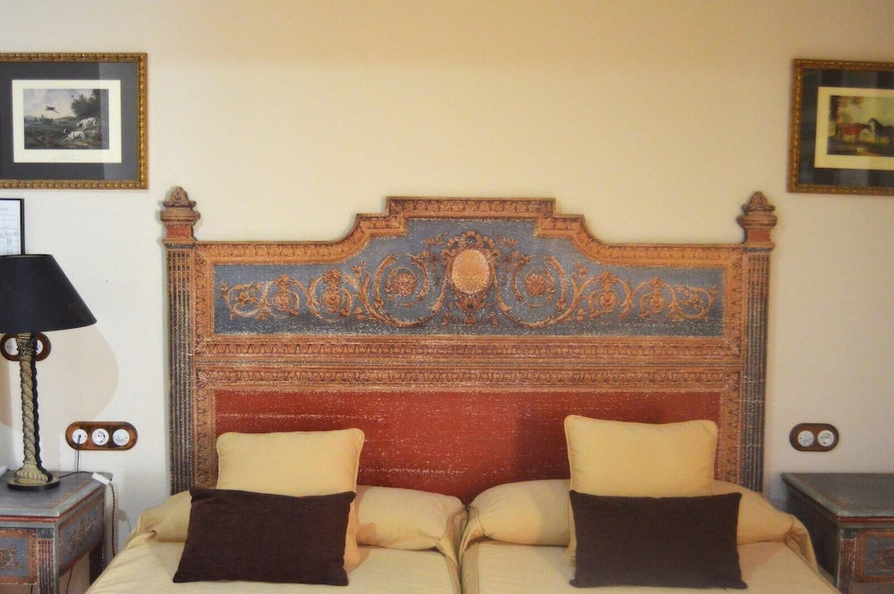 Habitación con 2 camas individuales del hotel Hacienda Montija. Foto 1