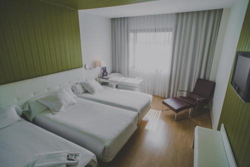 Habitación Triple Superior del hotel Zentral Castellana Norte. Foto 1