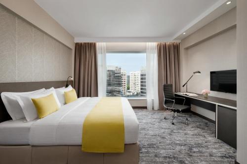 Habitación Deluxe con cama extragrande del hotel Park Hong Kong