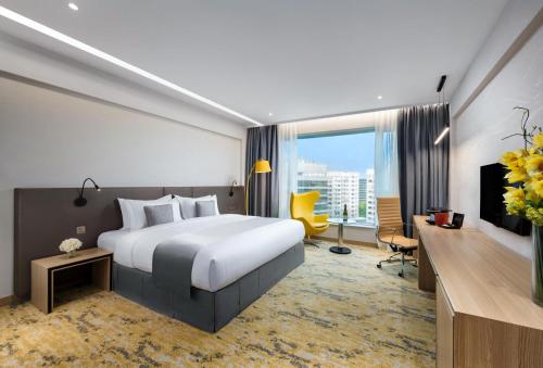 Habitación Doble Premier con cama extragrande del hotel Park Hong Kong. Foto 1