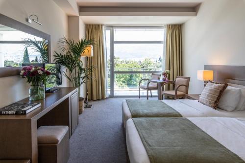 2 Habitaciones Dobles comunicadas del hotel Amalia Athens. Foto 5