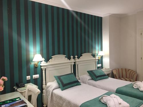 Habitación Doble - 2 camas del hotel Adriano. Foto 12