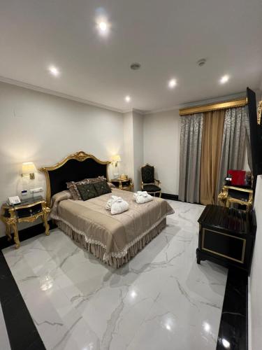 Habitación Doble Deluxe con balcón del hotel Adriano