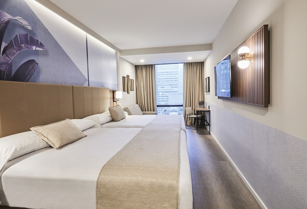 Habitación Deluxe, varias camas del hotel Riu Plaza Manhattan Times Square