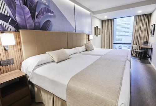 Deluxe con 2 camas grandes del hotel Riu Plaza Manhattan Times Square. Foto 3