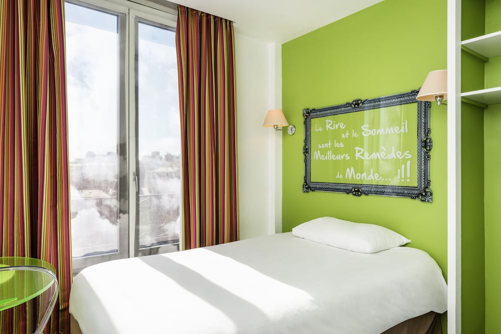 Habitación Standard con una cama individual de 120 cm del hotel Ibis Styles Asnières Centre. Foto 4