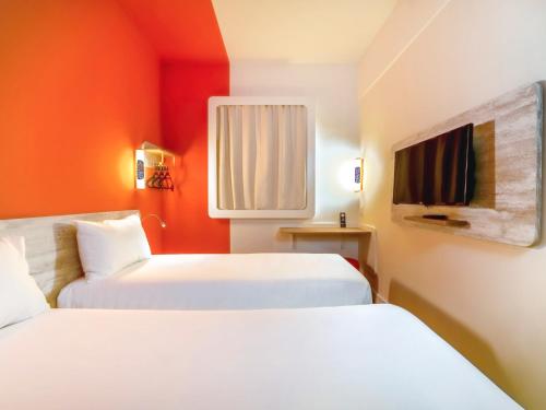 Habitación Doble Estándar - 2 camas del hotel ibis budget São Caetano. Foto 4