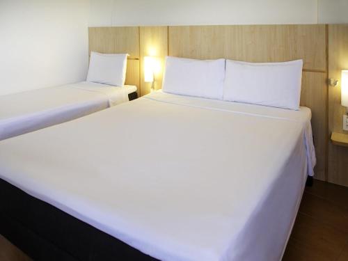 Habitación Doble Estándar con cama individual del hotel Ibis Maceio Pajucara
