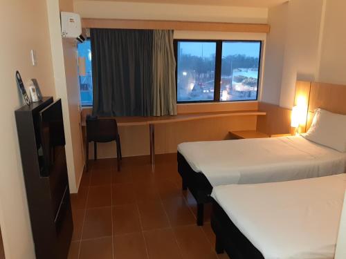 Habitación Doble Estándar - 2 camas del hotel Ibis Maceio Pajucara. Foto 5