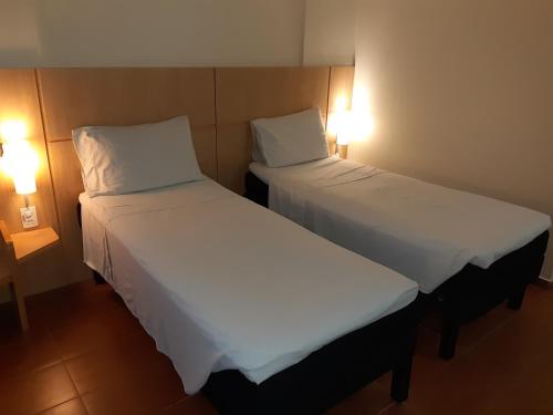 Habitación Doble Estándar - 2 camas del hotel Ibis Maceio Pajucara. Foto 7