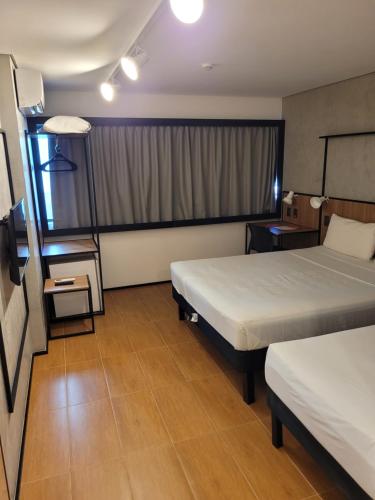 Habitación Triple Confort del hotel Ibis Maceio Pajucara. Foto 1