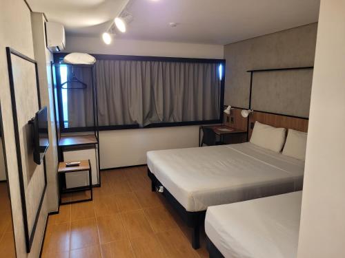 Habitación Triple Confort del hotel Ibis Maceio Pajucara. Foto 3