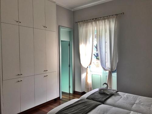 Standard Twin Room with Sofa del hotel Triana. Foto 11