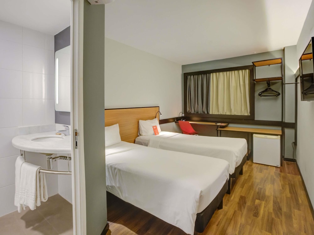 Habitación Standard con 2 camas individuales del hotel Ibis Rio De Janeiro Santos Dumont. Foto 7