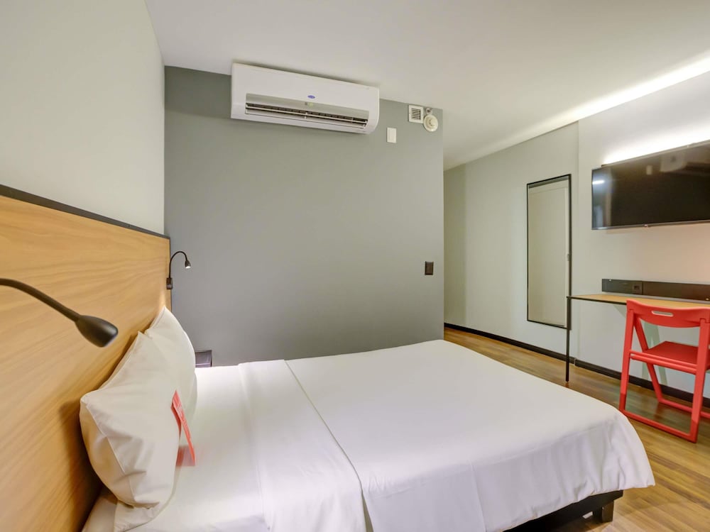 Habitación Standard adaptada con una cama doble del hotel Ibis Rio De Janeiro Santos Dumont. Foto 1