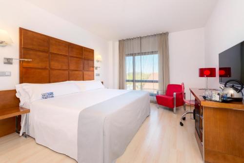 Habitación Individual Premium - Cama extragrande del hotel Zentral Ave. Foto 4