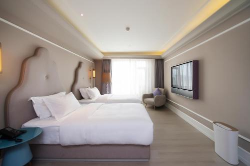 Habitación Executive - 2 camas del hotel Mercure Harbin Institute. Foto 4