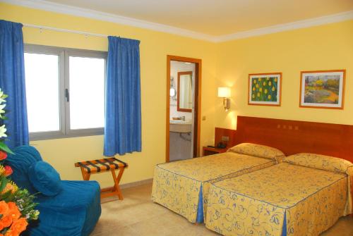 Habitación Doble con cama supletoria del hotel Pujol